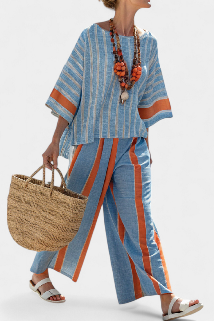 Valeria – top striato terracotta sofisticato e pantaloni in lino