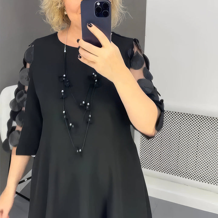 Robe lunga oversize con decorazione